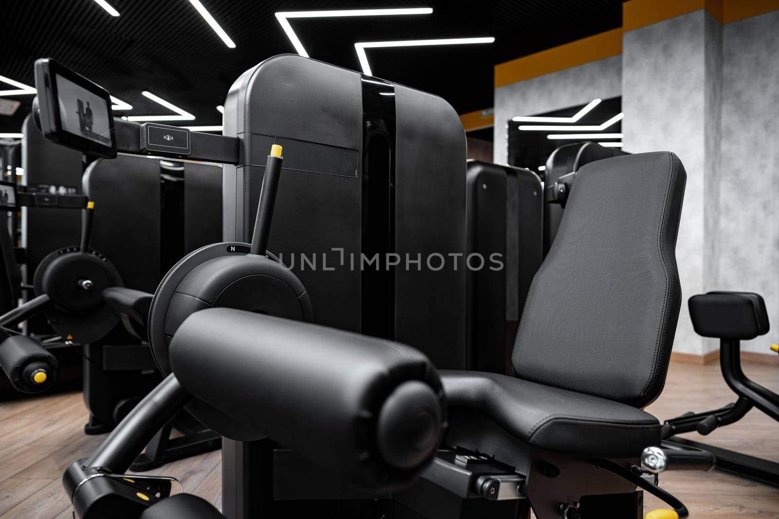 Modern gym interior with new fitness equipment, no people