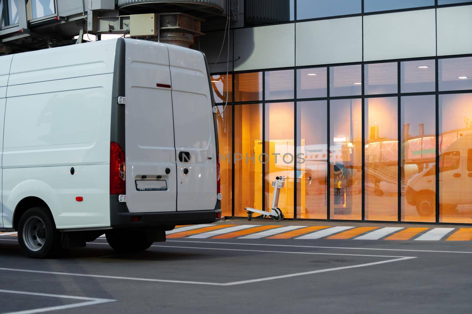 Service vehicle truck parked near the airport terminal building