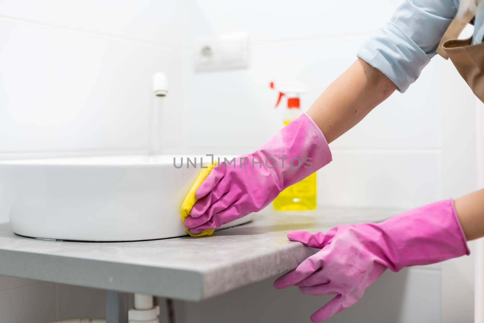 Clean up your house, woman cleaning the bathroom