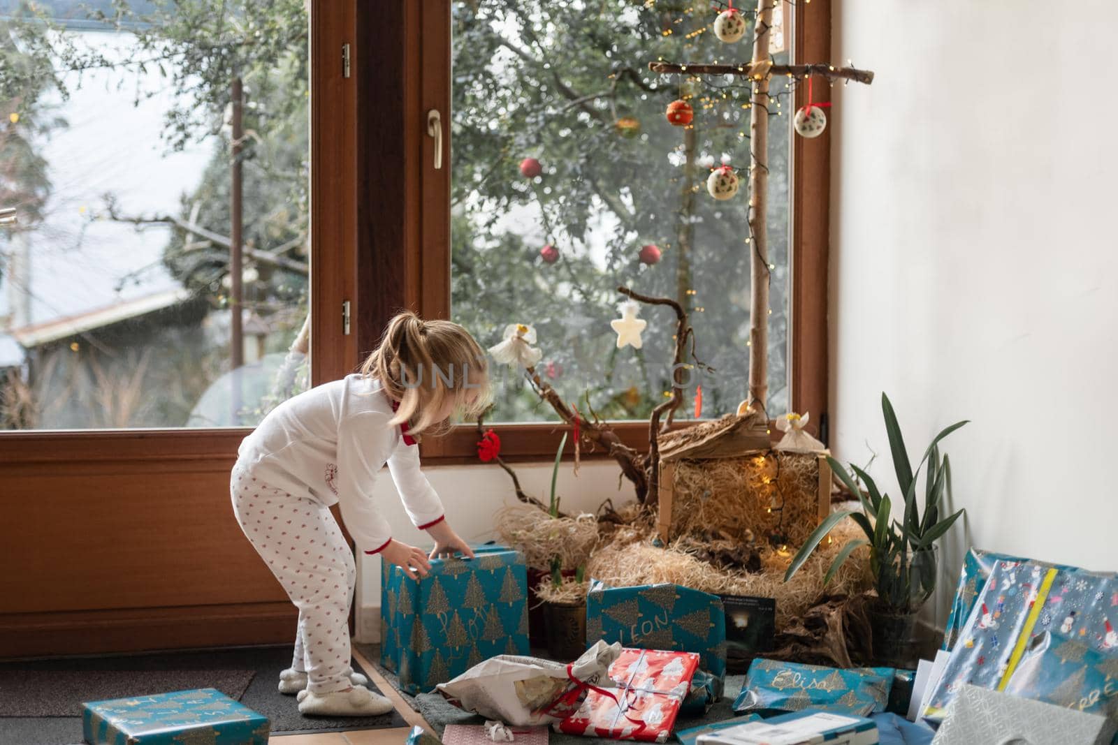 Girl is surprised with a christmas present