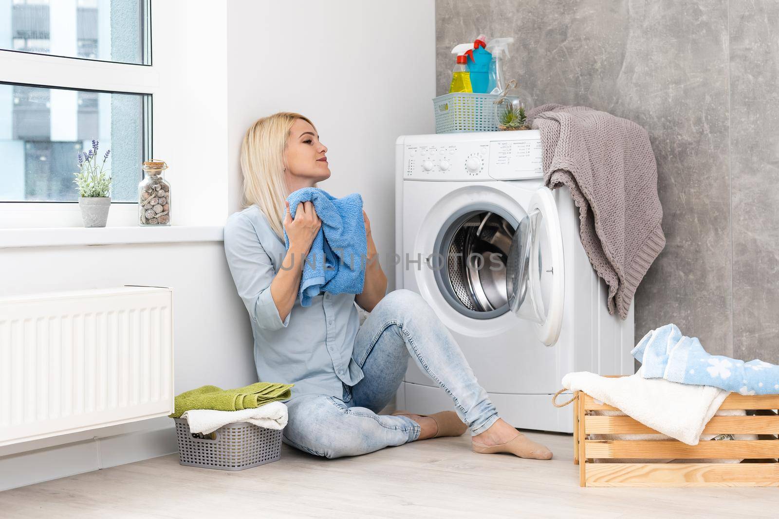 pretty smiling girl in the laundry room