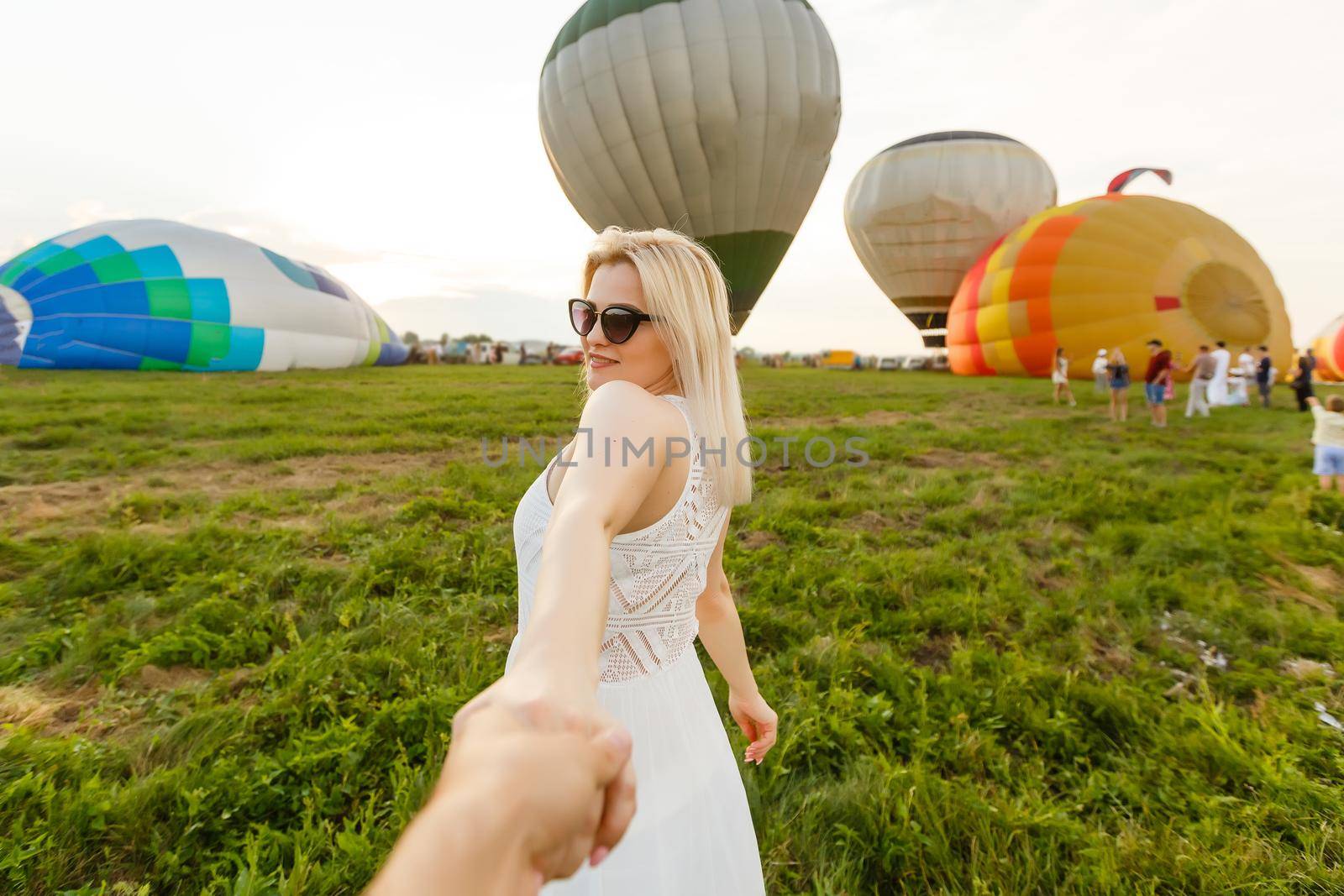 Amazing view with woman and air balloon. Artistic picture. Beauty world. The feeling of complete freedom