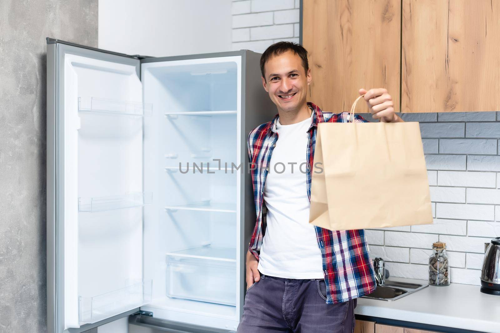 delivery man with paper containers for takeaway food.