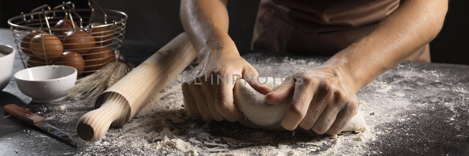 chef using hands flour knead dough by Zahard