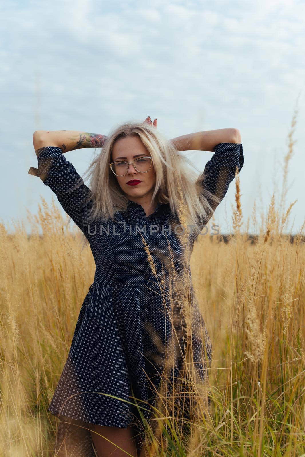 Beautiful girl villager posing in a dress in the field by zartarn