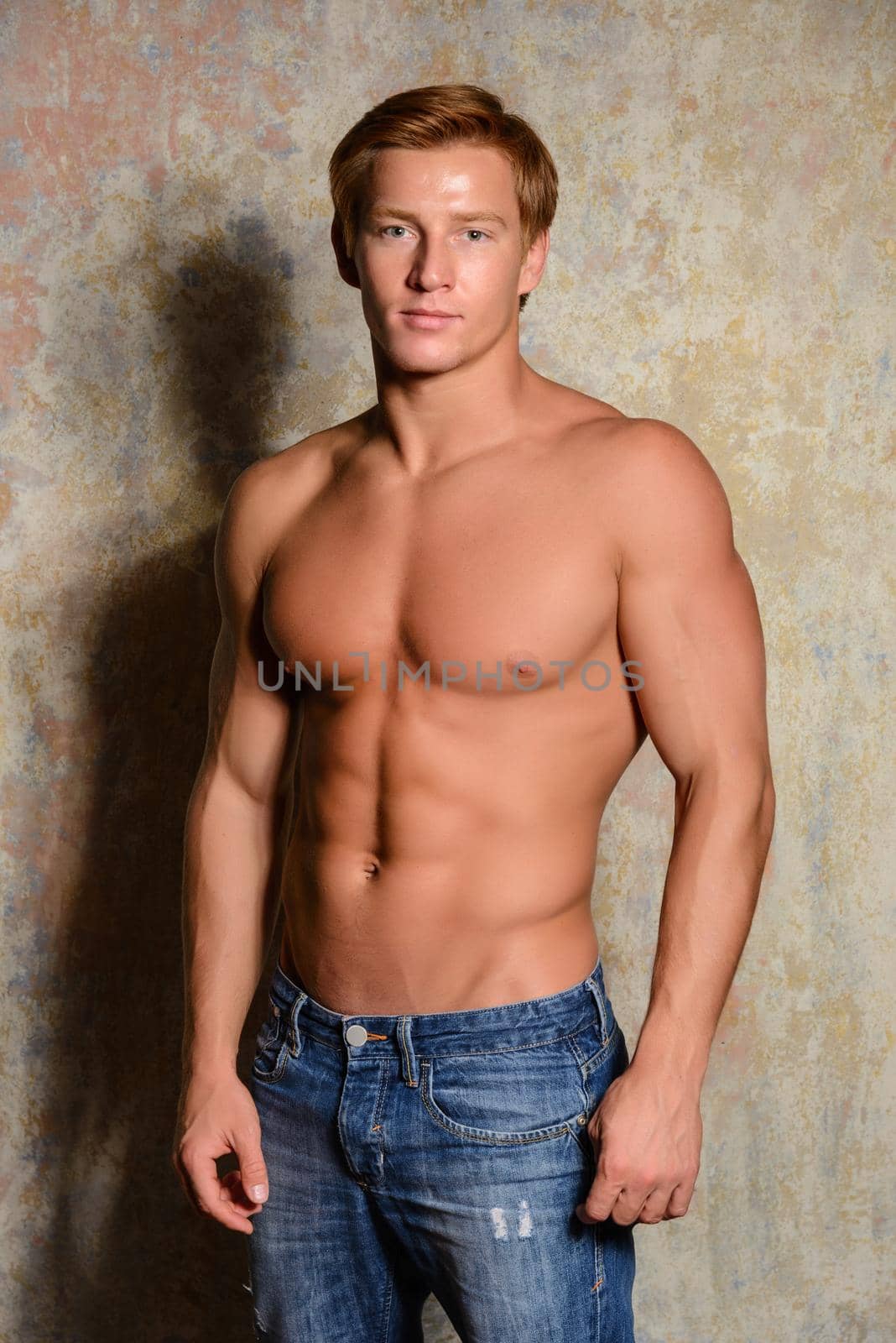 handsome young bodybuilder posing shirtless by zartarn