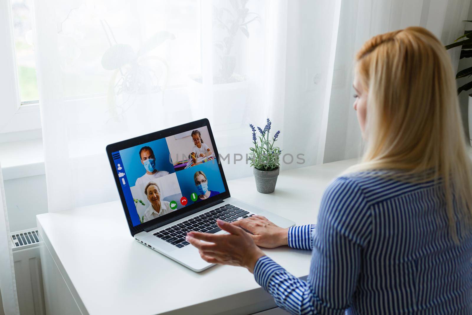 Global communication concept using video conferencing on a laptop by Andelov13