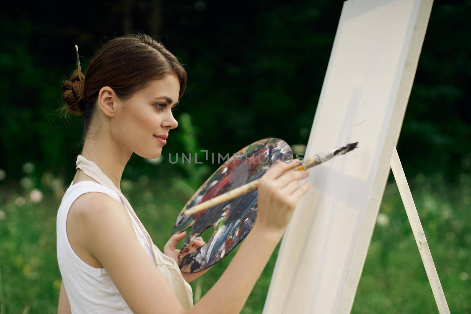 woman outdoors paint a picture landscape hobby creative by Vichizh