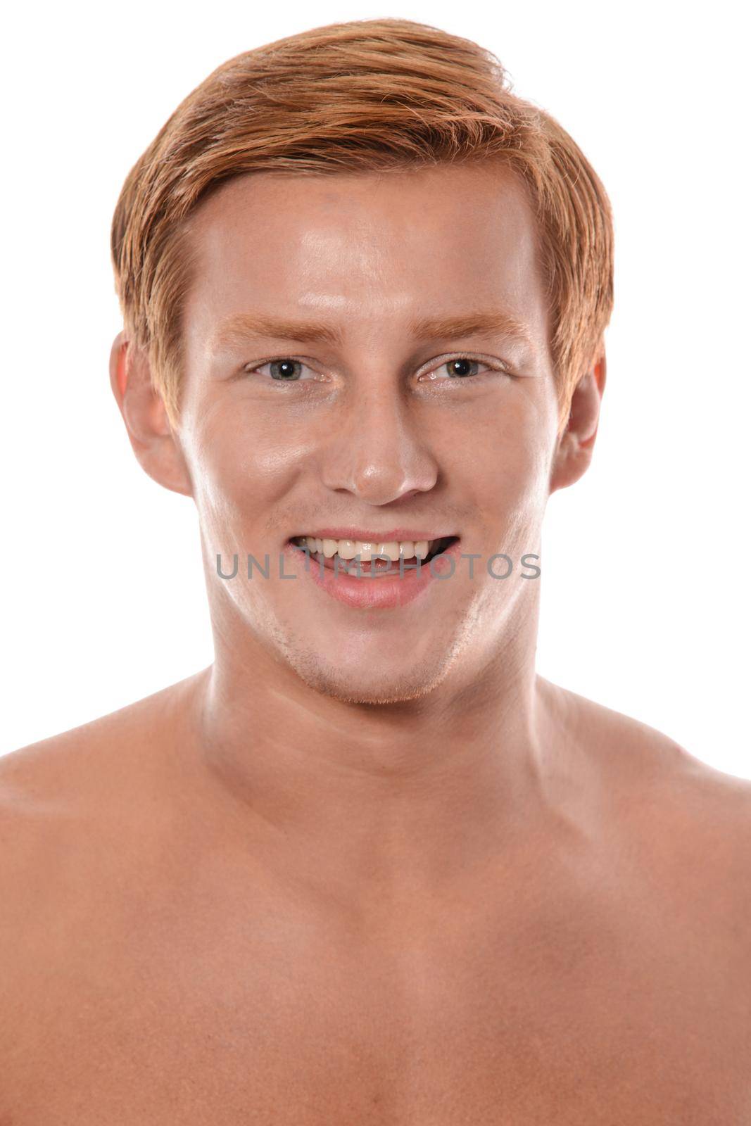 Handsome young man portrait isolated on white background. Muscular teenage guy portrait. Teenager boy face closeup