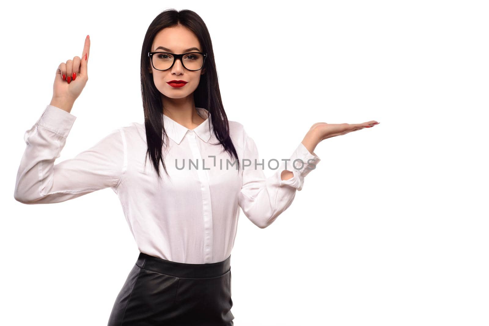 Business woman in glasses presenting isolated on white background.