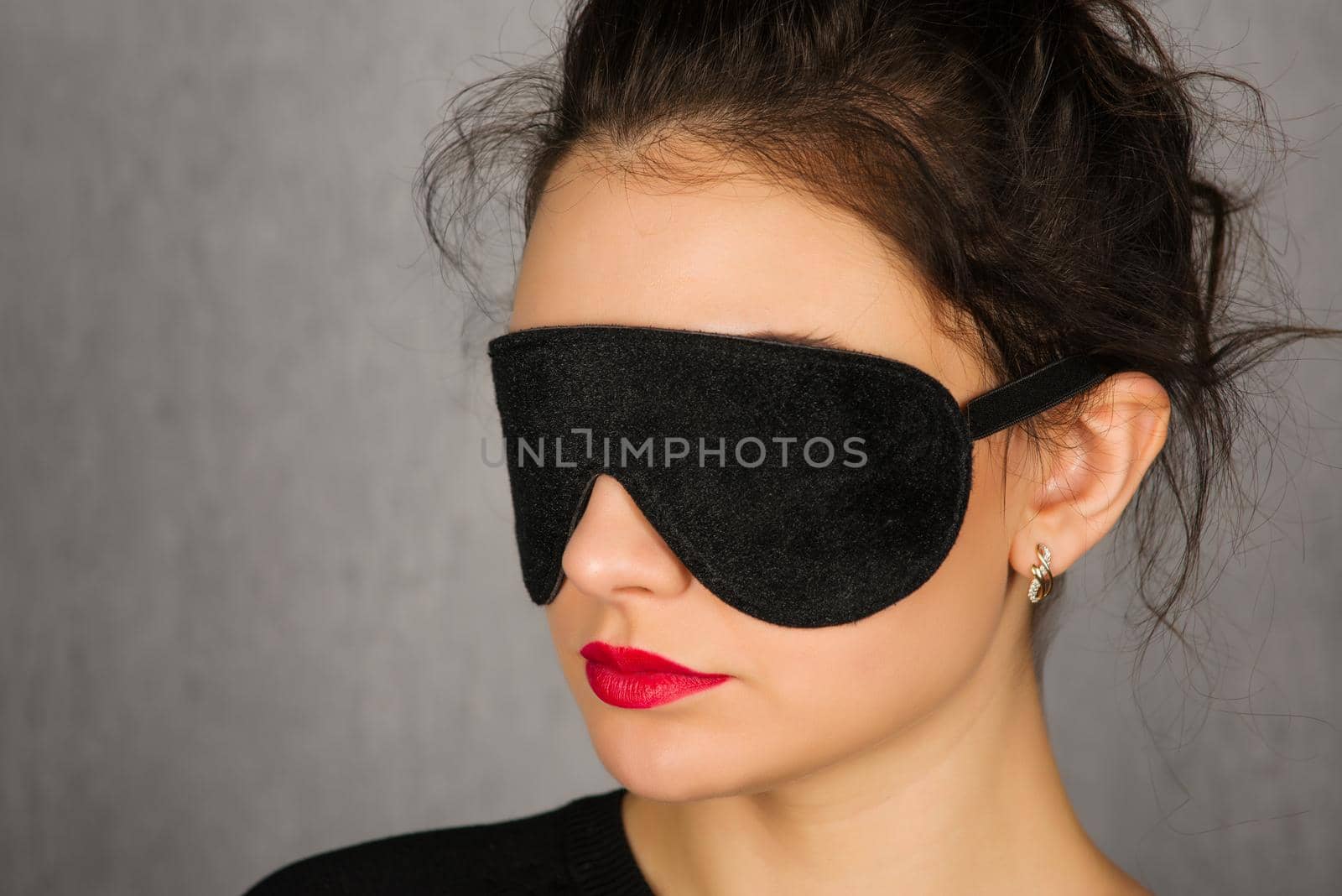 Gorgeous young woman with black sleep mask - Image