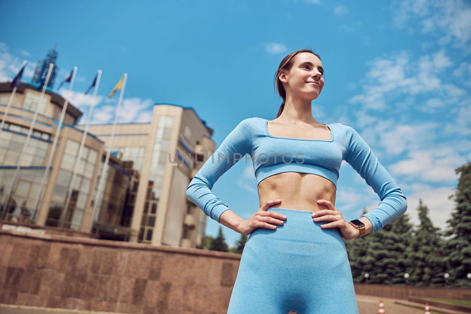 Beautiful fit young woman jogger is running outdoors by Yaroslav_astakhov