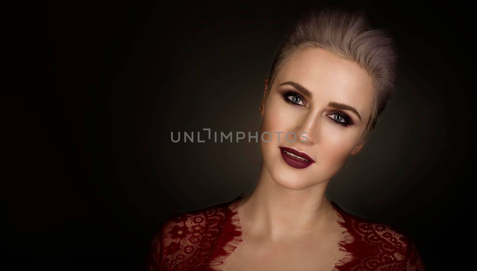 portrait of a beautiful blond woman with short hair and bright make-up by zartarn