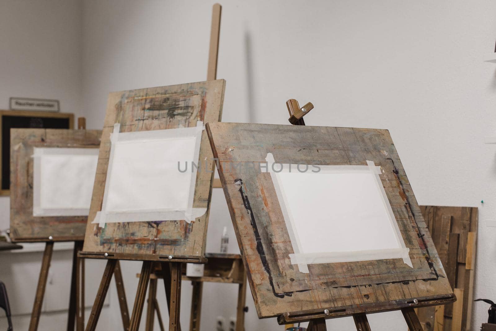 Sheets of paper on easels by Demkat