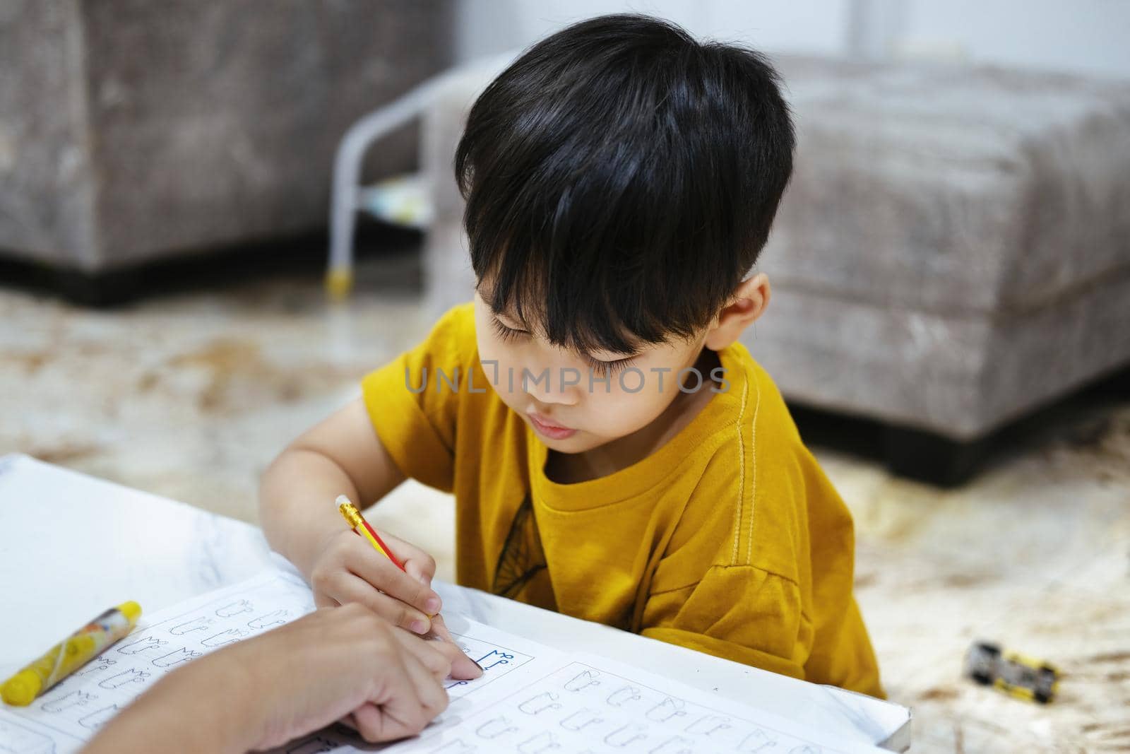 homework teaching education mother children son familiy childhood. by Manastrong