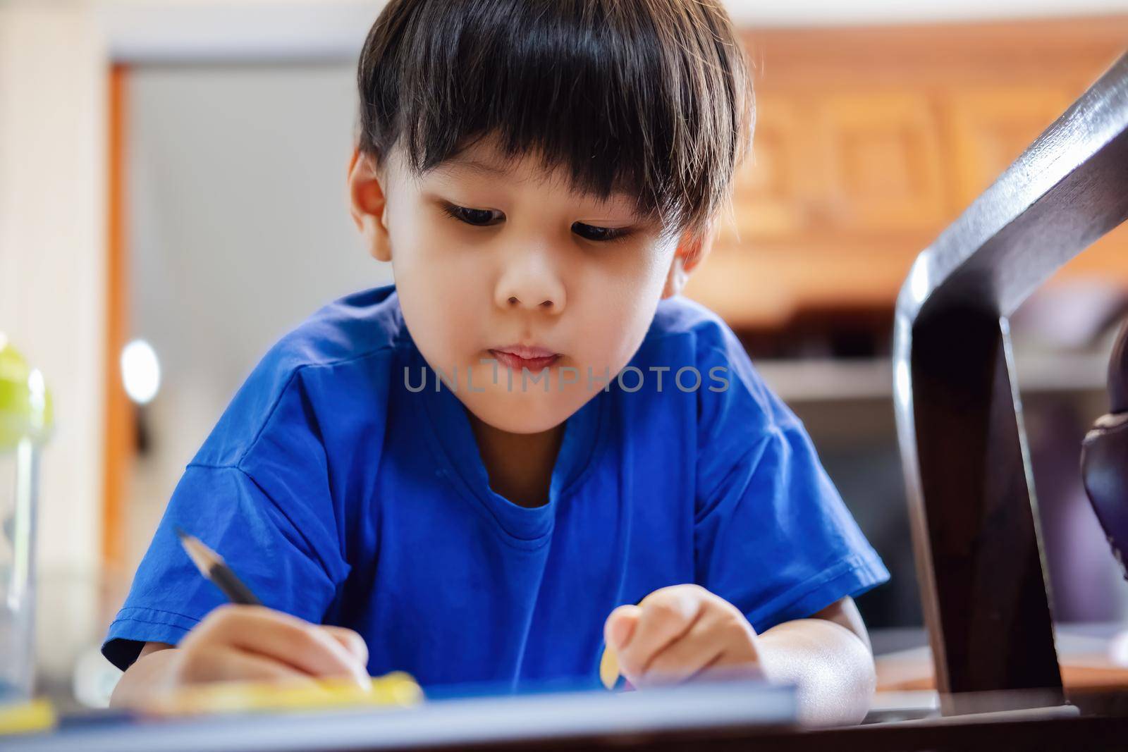 kindergarten children coloring their homework to the teacher. by Manastrong