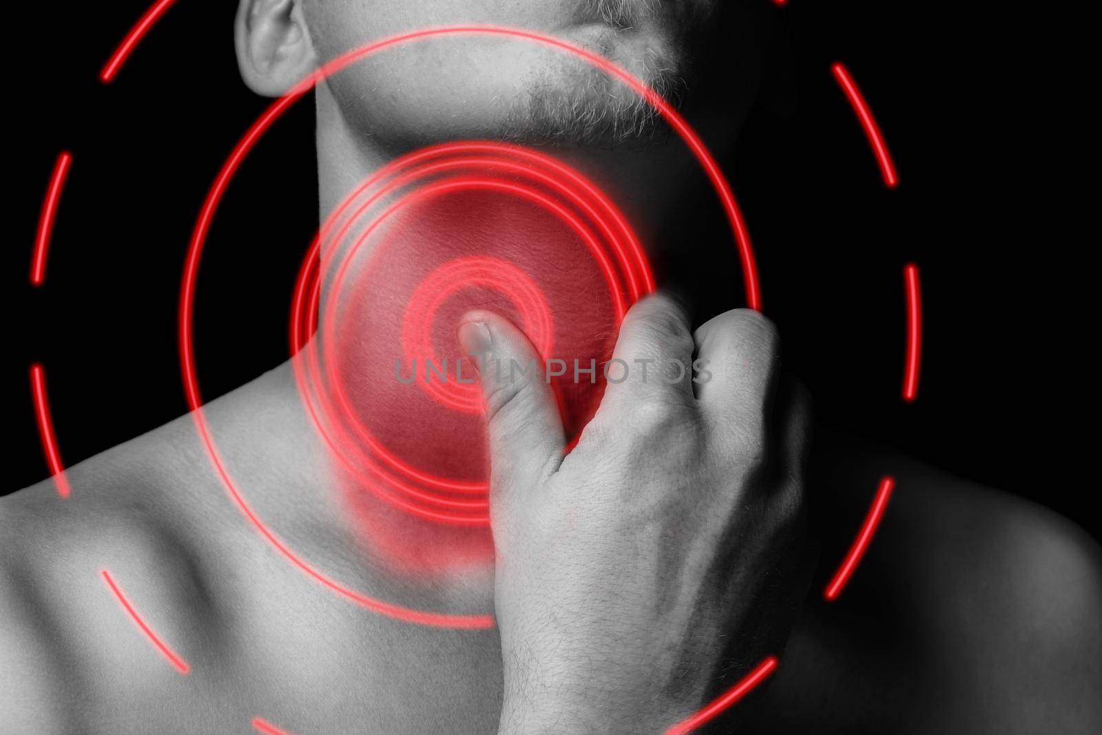 Man holds the throat, sore throat, monochrome image, pain area of red color