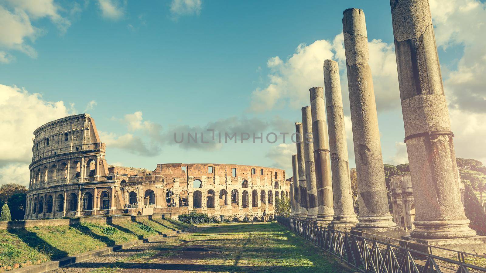 Ancient columns of the Roman temple near the Coliseum in Rome