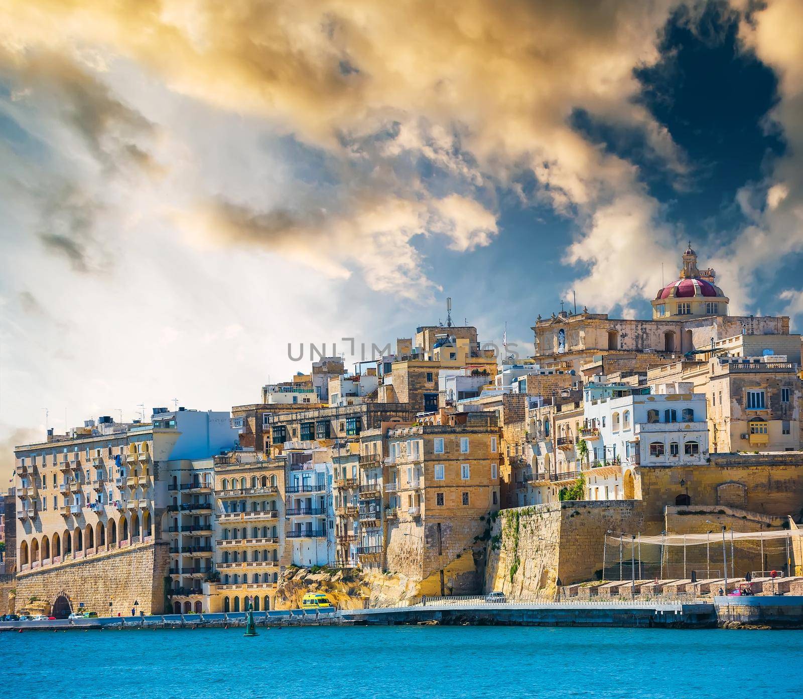 beautiful panoramic view on Valletta from the sea at sunset in Malta