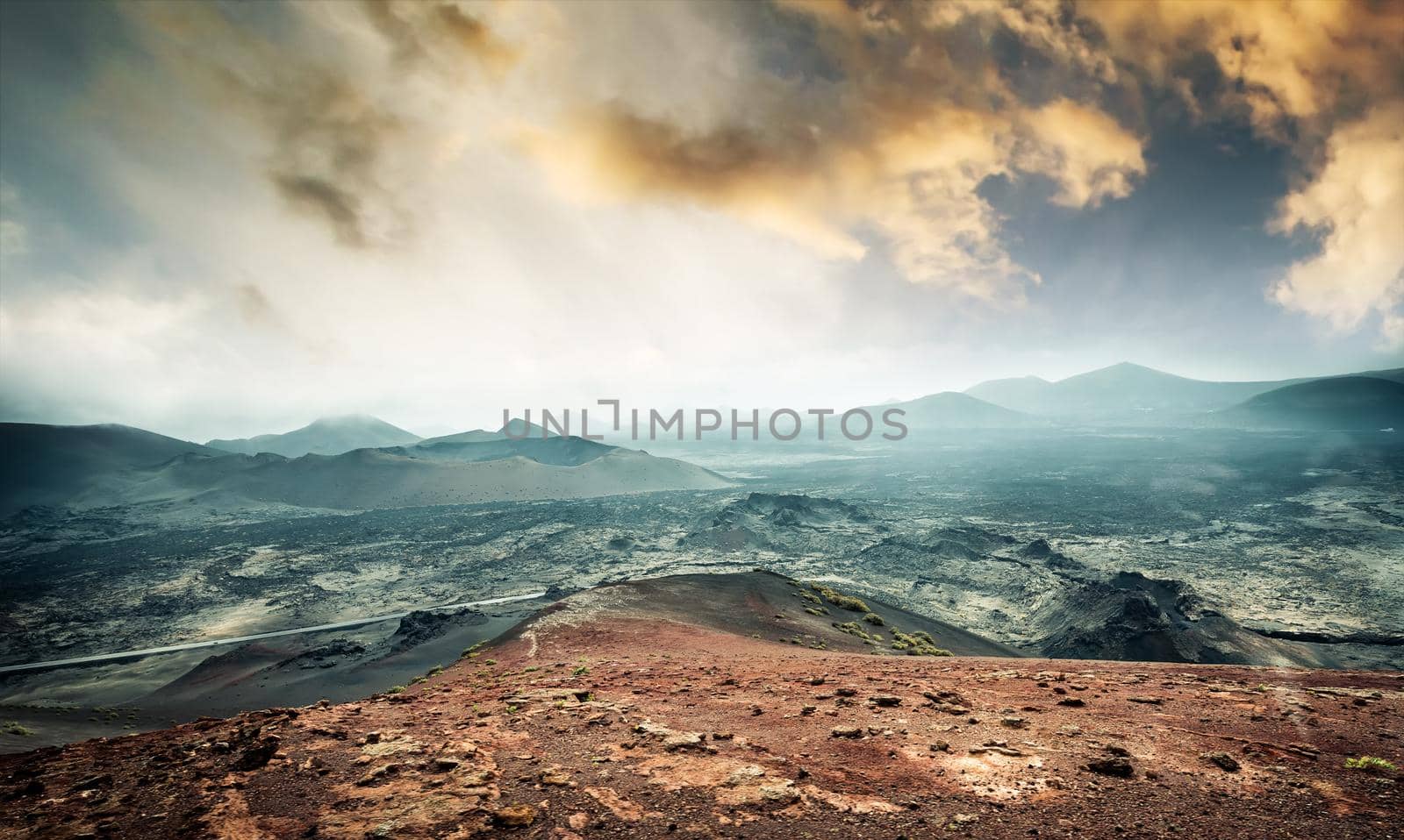 beautiful mountain landscape with volcanoes at sunset in Timanfaya National Park in Lanzarote, Canary Islands