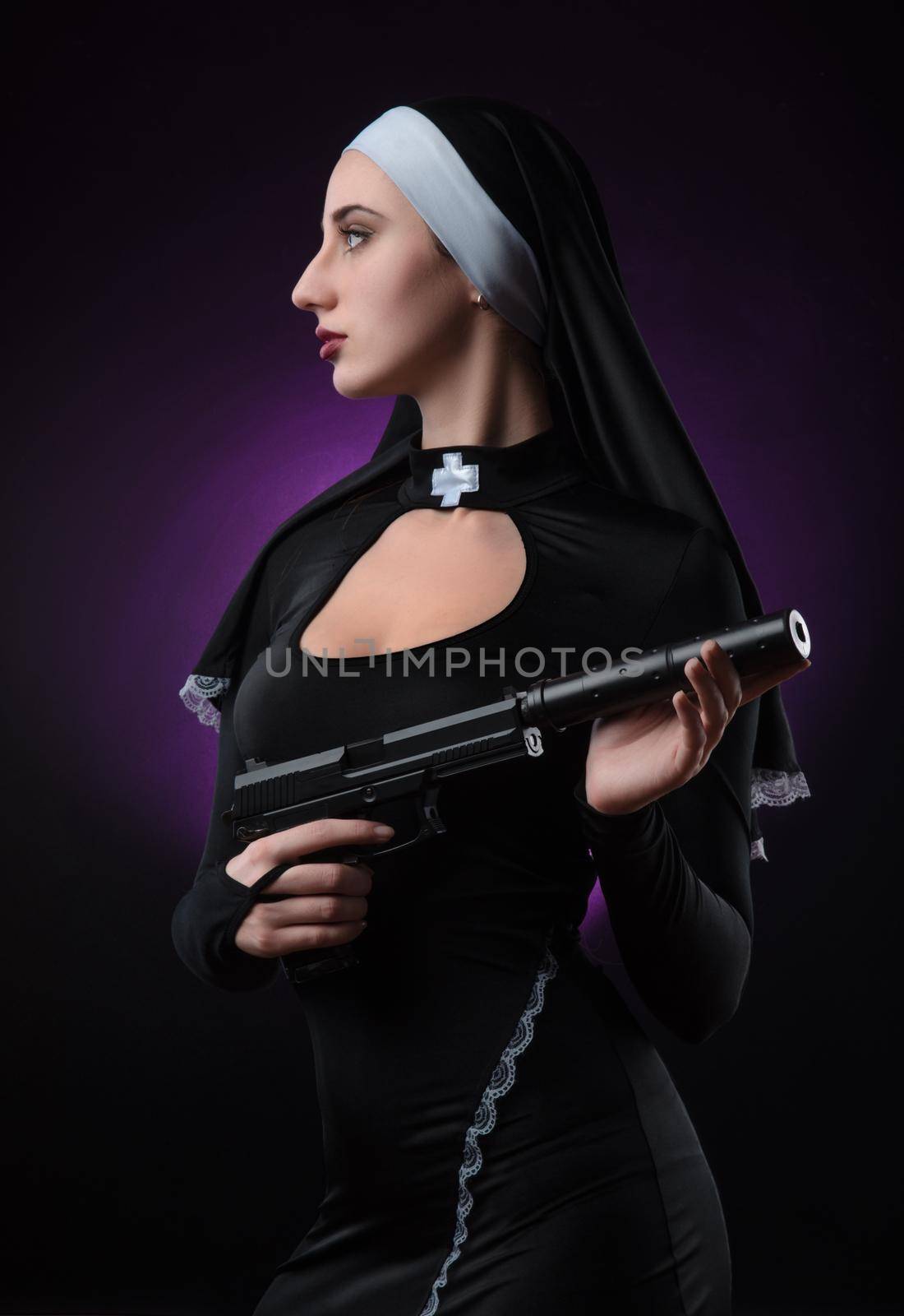 a nun with a weapon in the name of faith by Rotozey