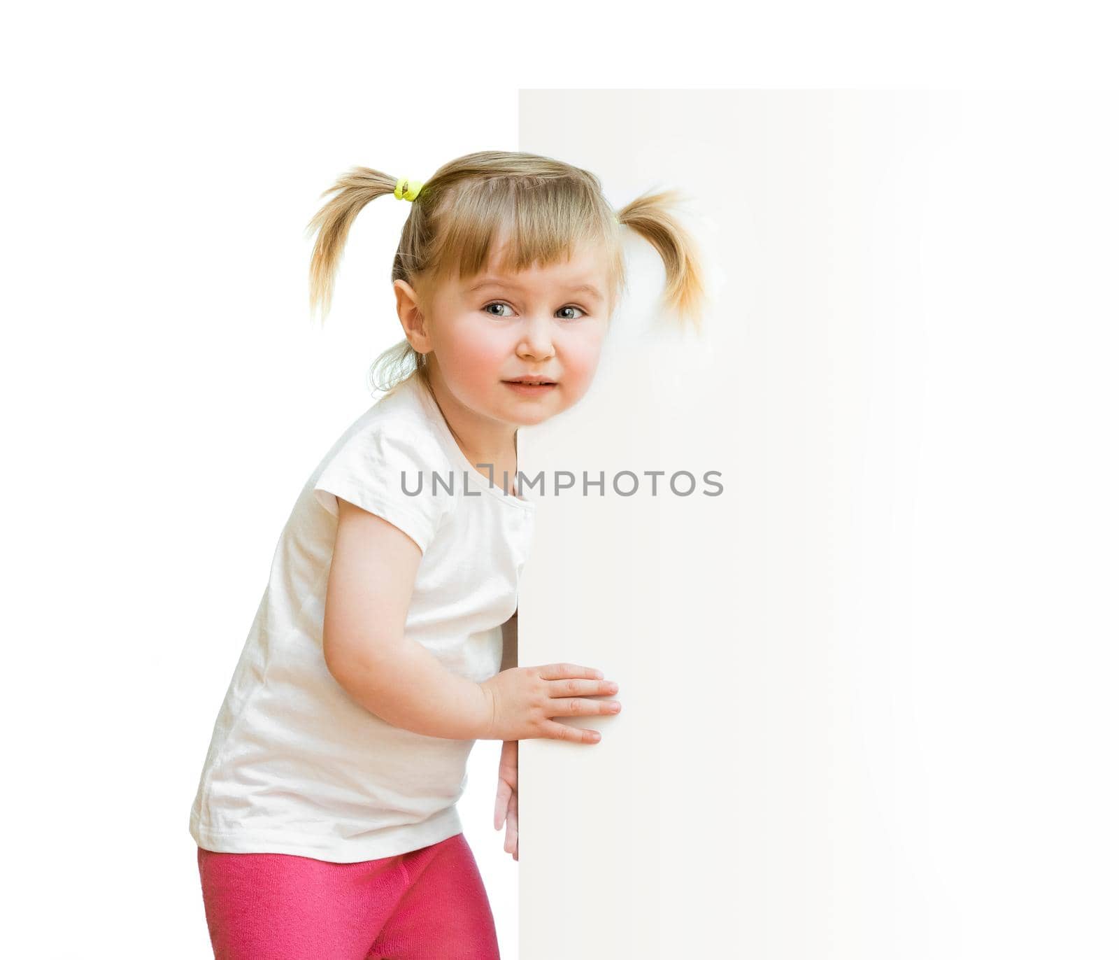 little pretty girl looks out of a board isolated on white background