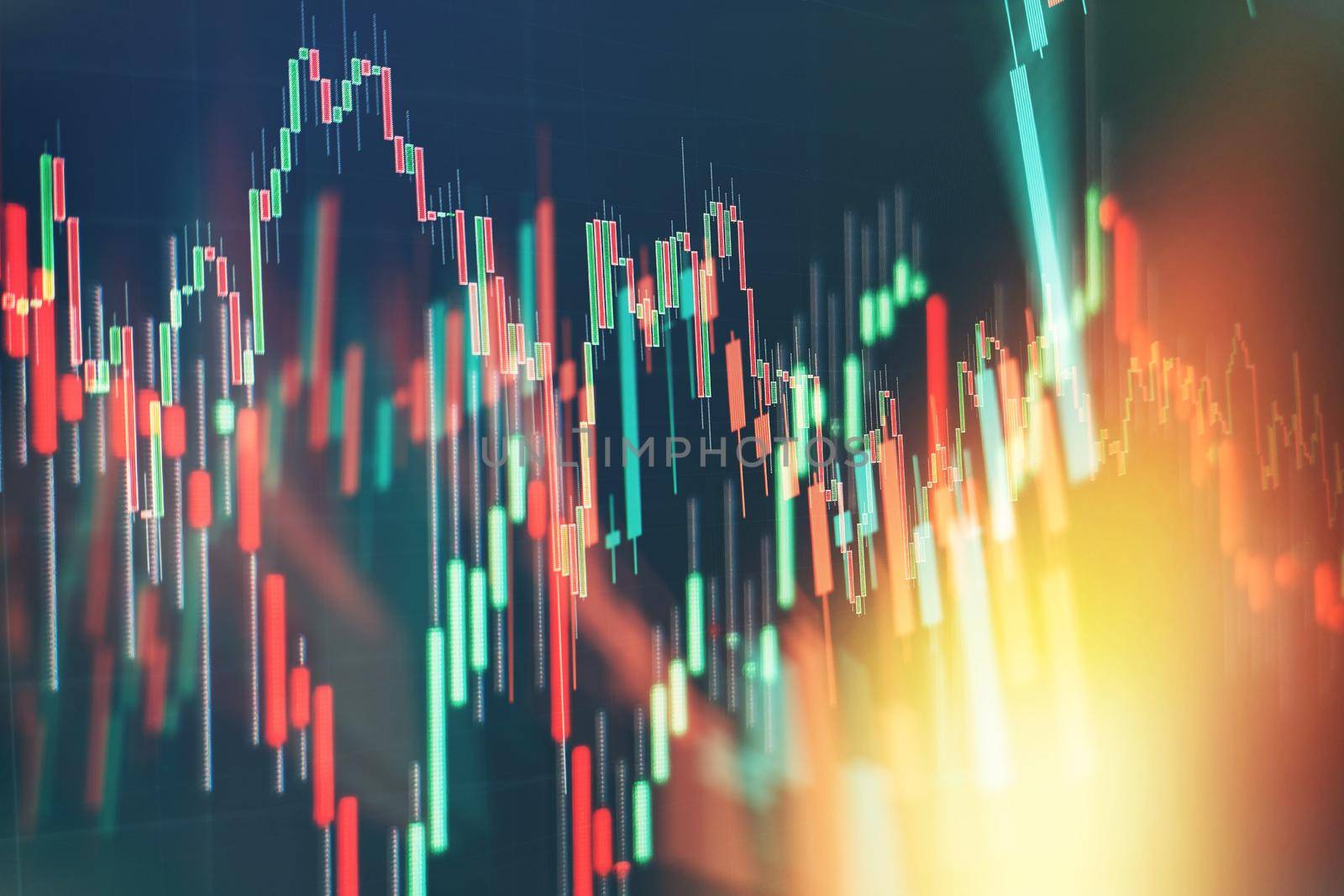 Analysis business accounting on info sheets. Businessman hand working on analyzing investment charts for Gold market, Forex market and Trading market .