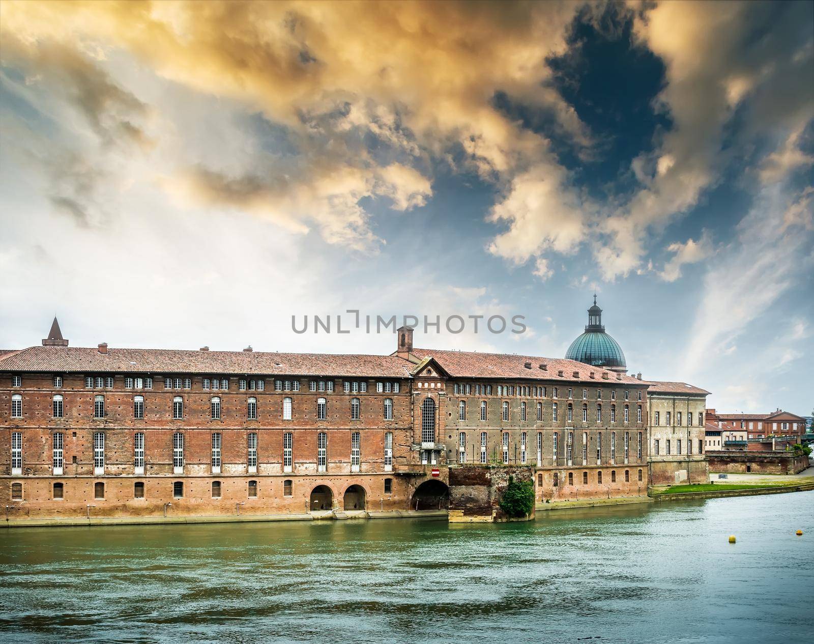 magestic view from river Sona on a building at sunset in Lyon, France