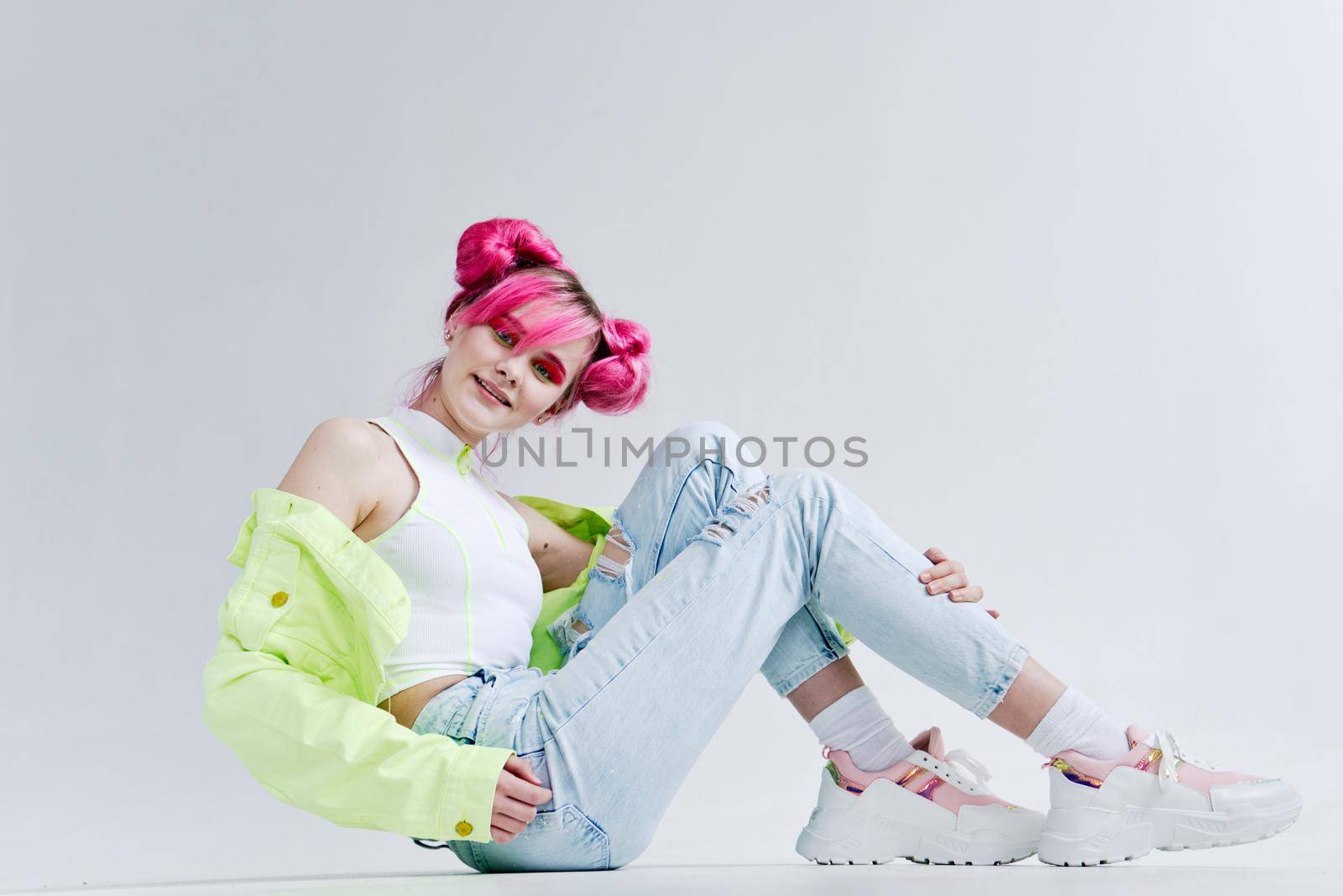 fashionable woman green jacket fashionable clothes studio model. High quality photo