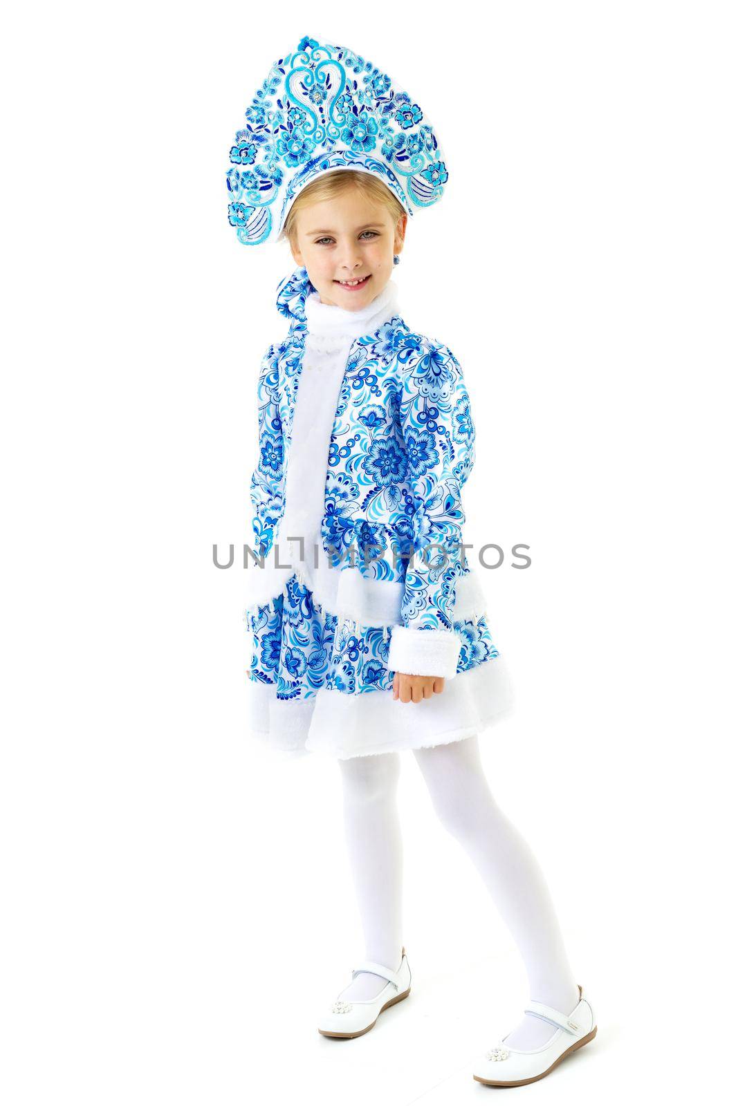 Lovely girl in Snow Maiden costume. Happy girl dressed in traditional Russian Christmas Snegurochka costume. Happy Christmas and New Year concept