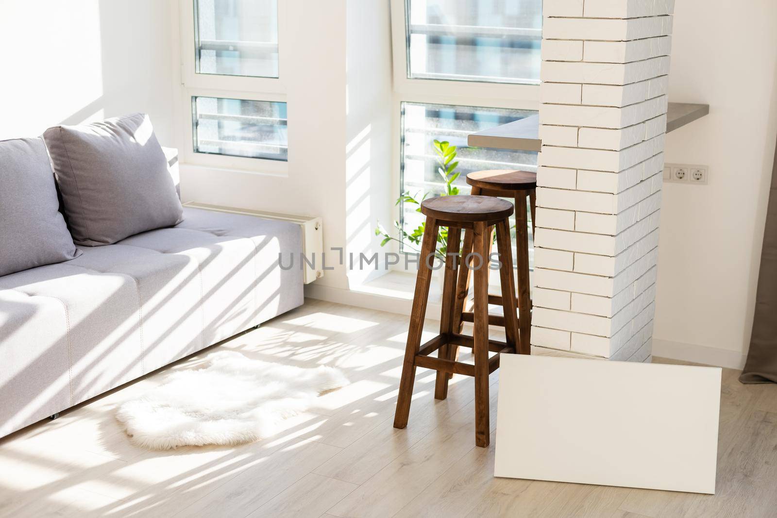 white photo canvas stands in the room