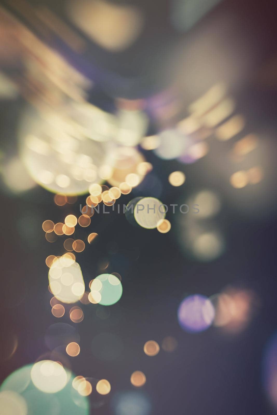 celebration background with defocused golden lights for Christmas, New Year, Holiday, party