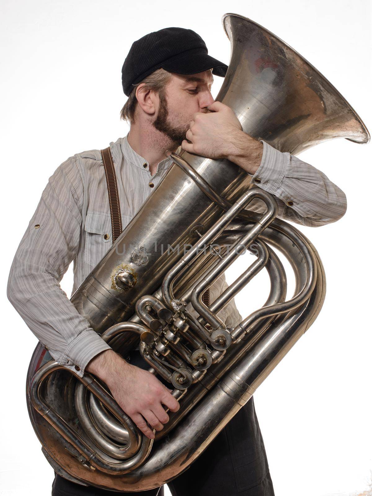 beard loving man with suspenders and cap tube kisses