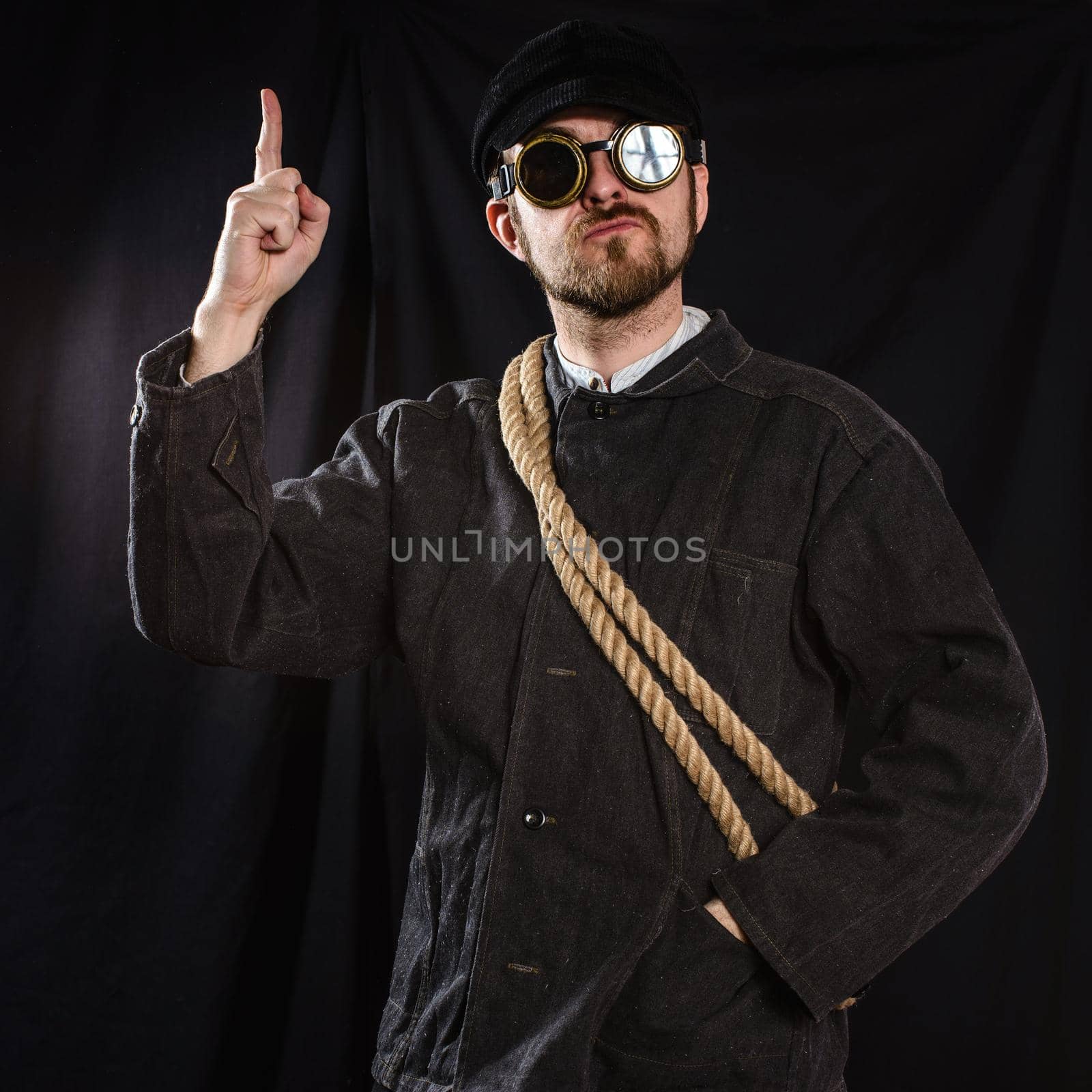 workman pointing a great idea . black background