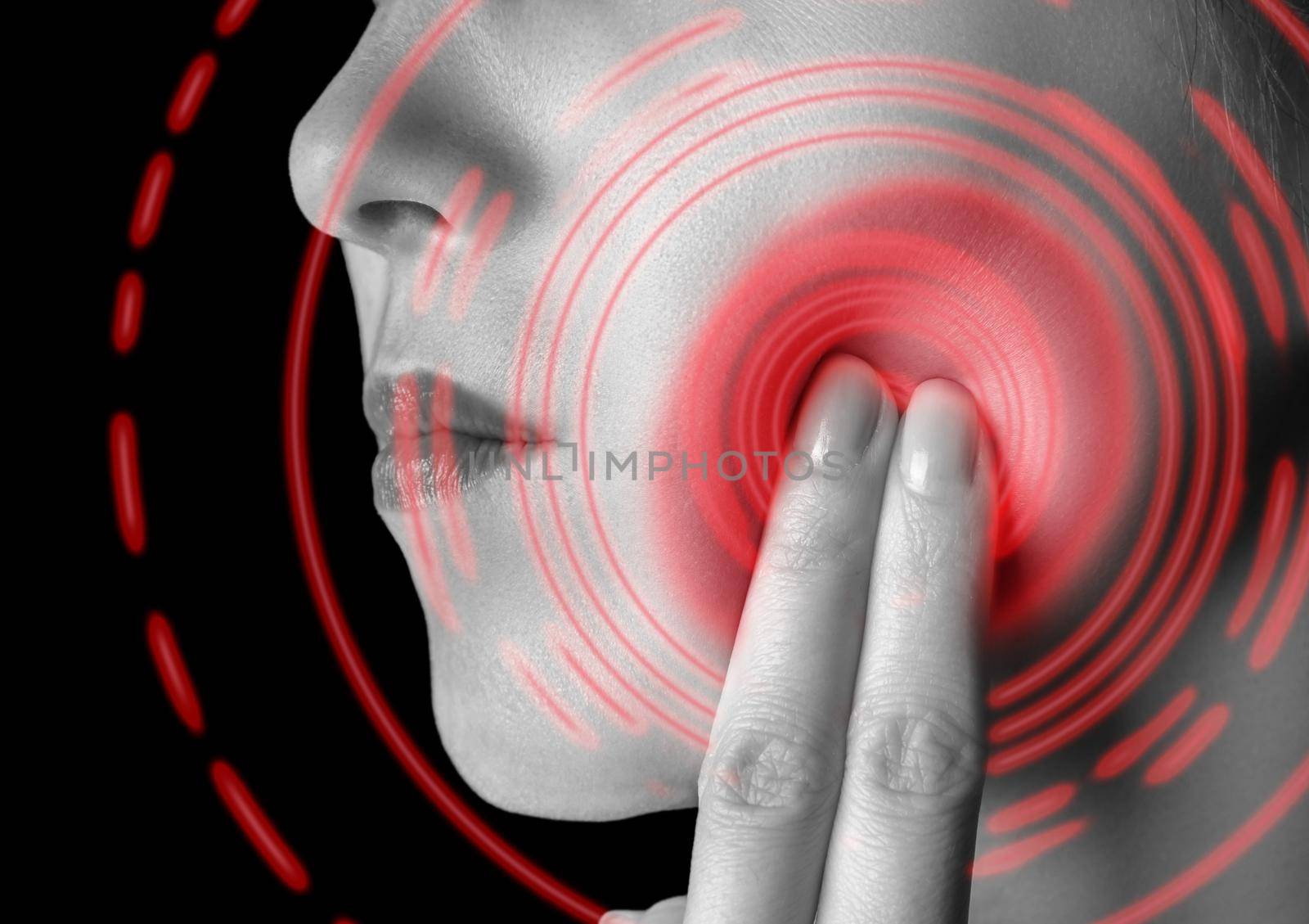 Woman is touching her cheek, toothache, pain area of red color, monochrome image