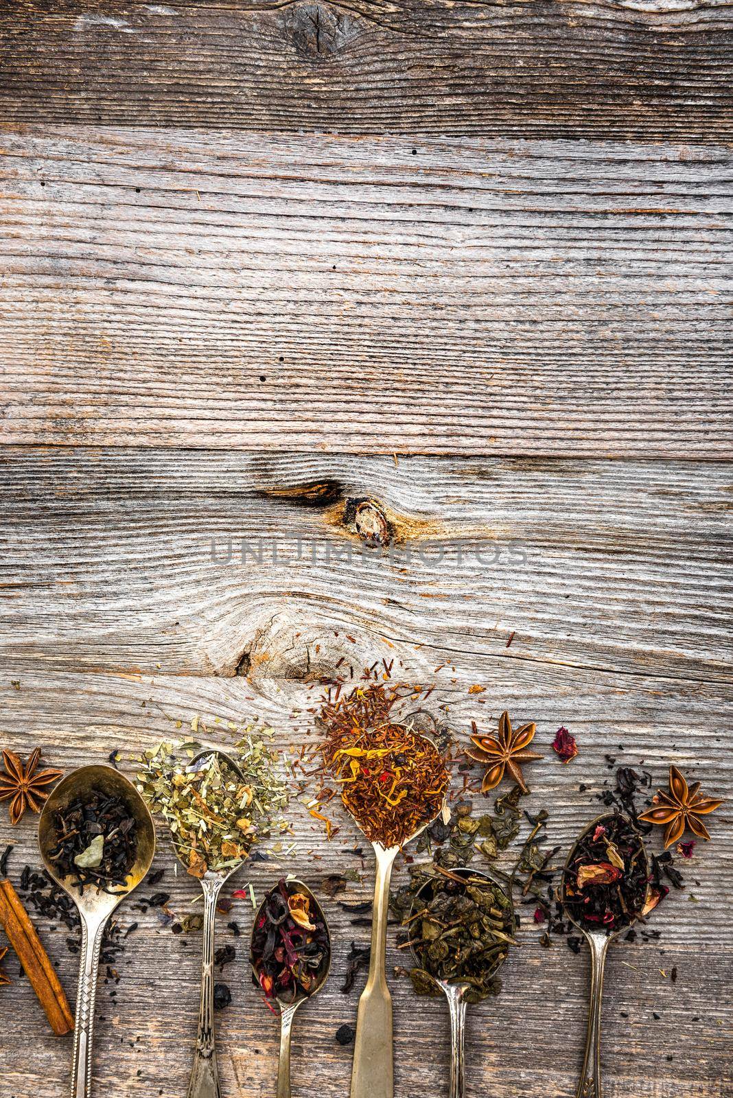 dry teas on wooden background by GekaSkr