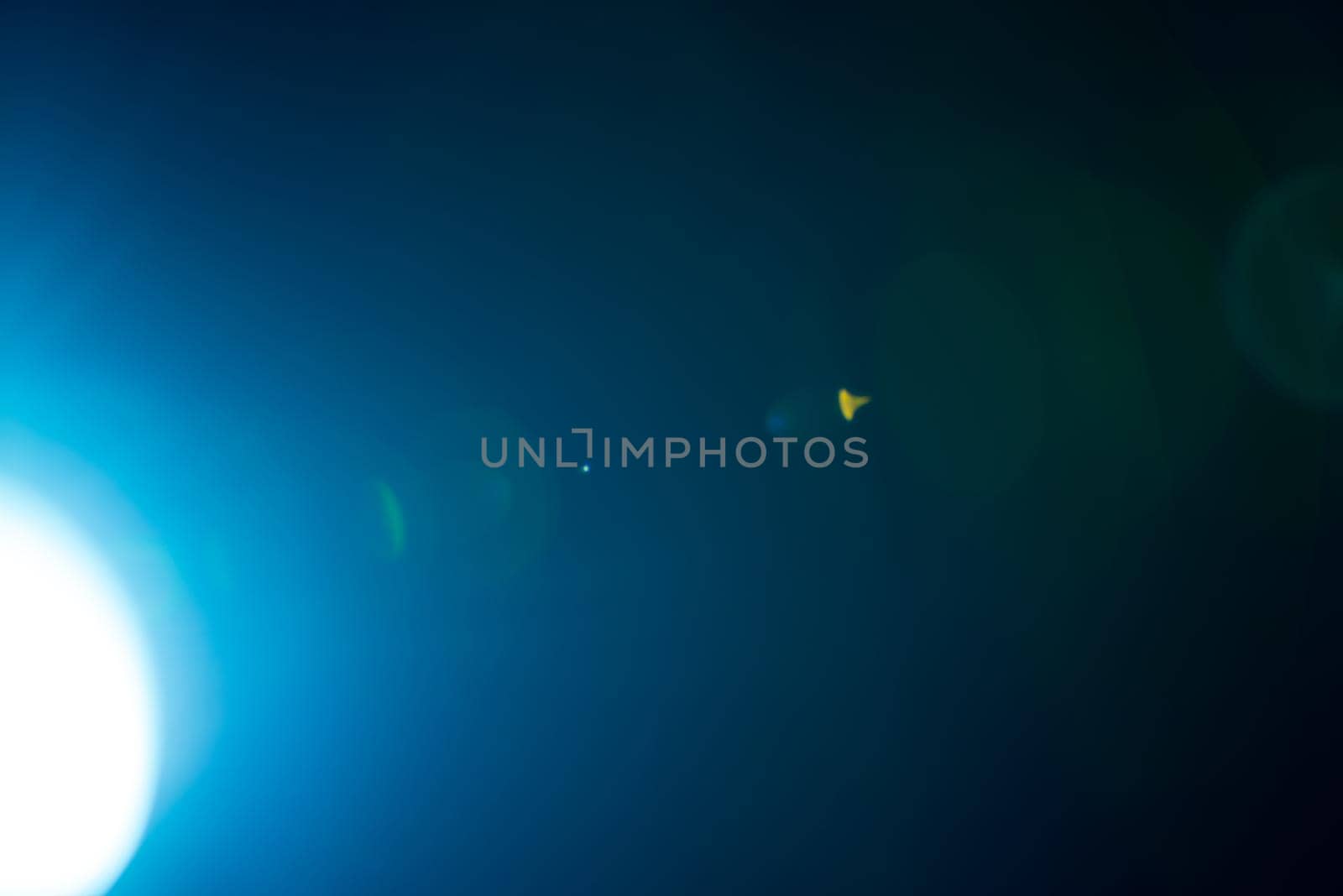 Flash of a distant abstract star. Abstract sun flare. The lens flare is subject to digital correction. - Image