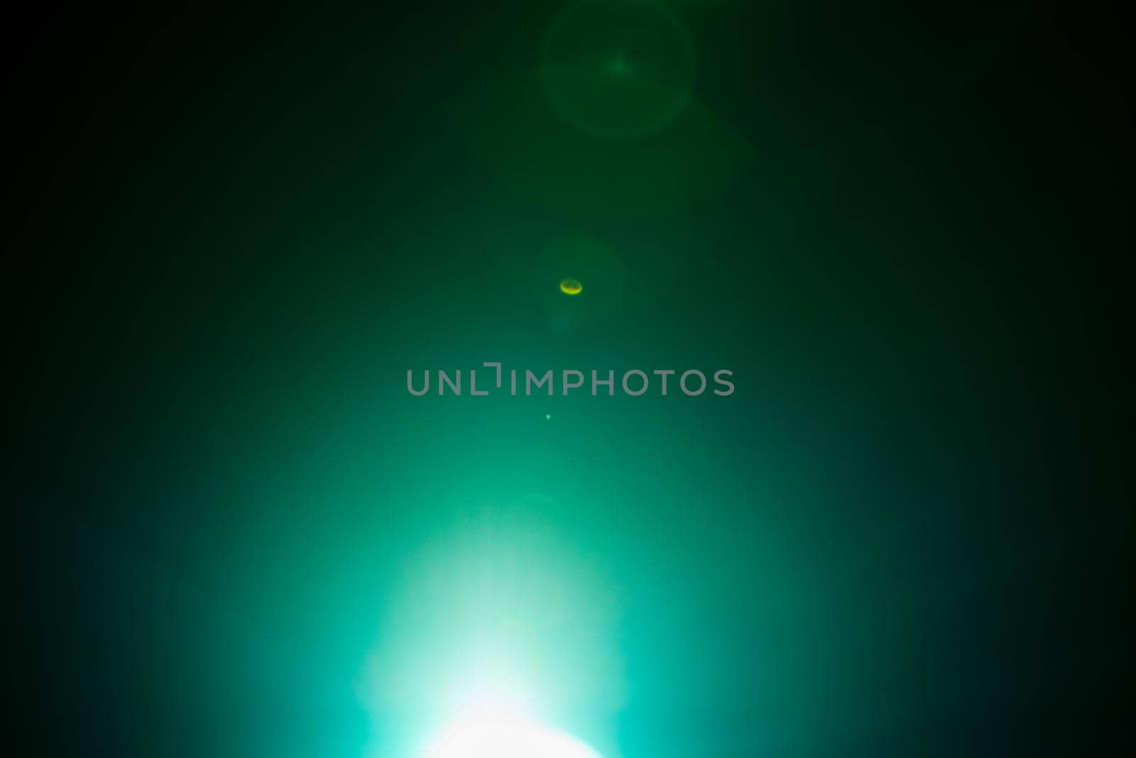 Flash of a distant abstract star. Abstract sun flare. The lens flare is subject to digital correction. - Image