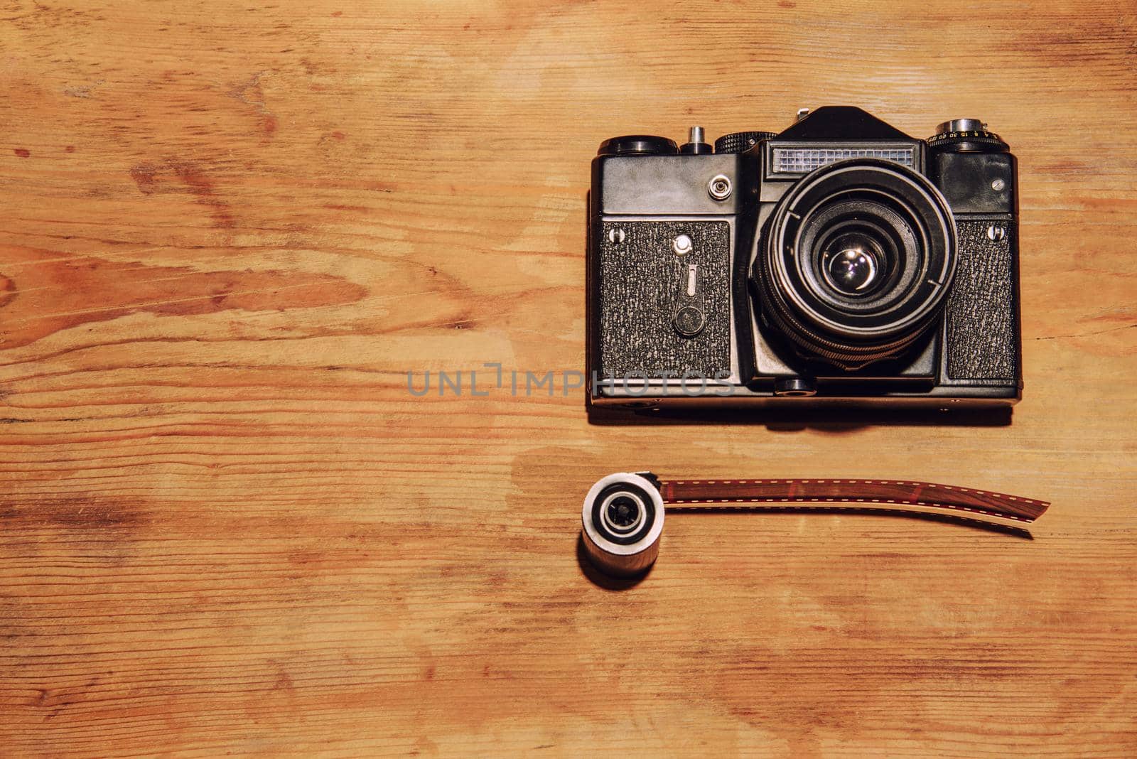 Vintage camera on wooden background