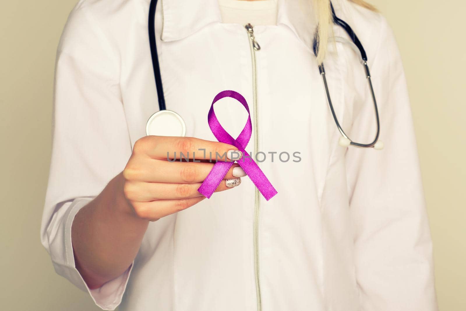 Female doctor in white uniform with purple awareness of ribbon in hand for ADD,ADHD,Alzheimer Disease ,Arnold Chiari Malformation,Childhood Hemiplegia stroke, Epilepsy, Chronic Acute Pain,Crohns - Image