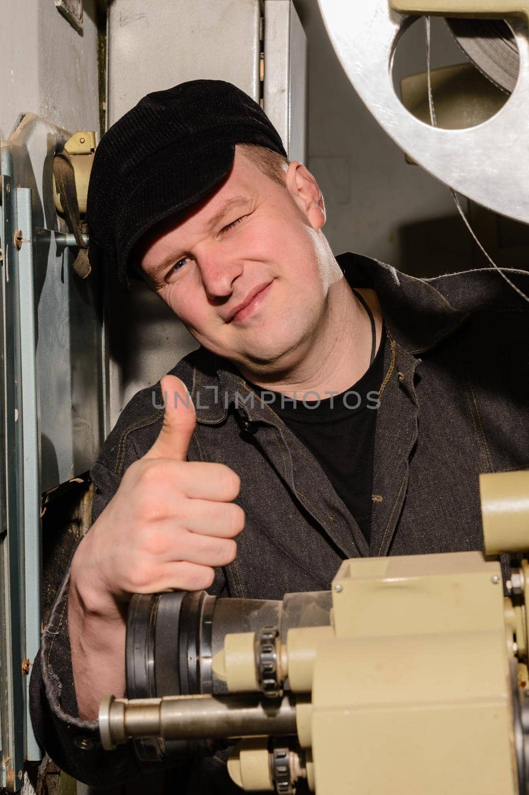 projectionist at work in the room projectionist