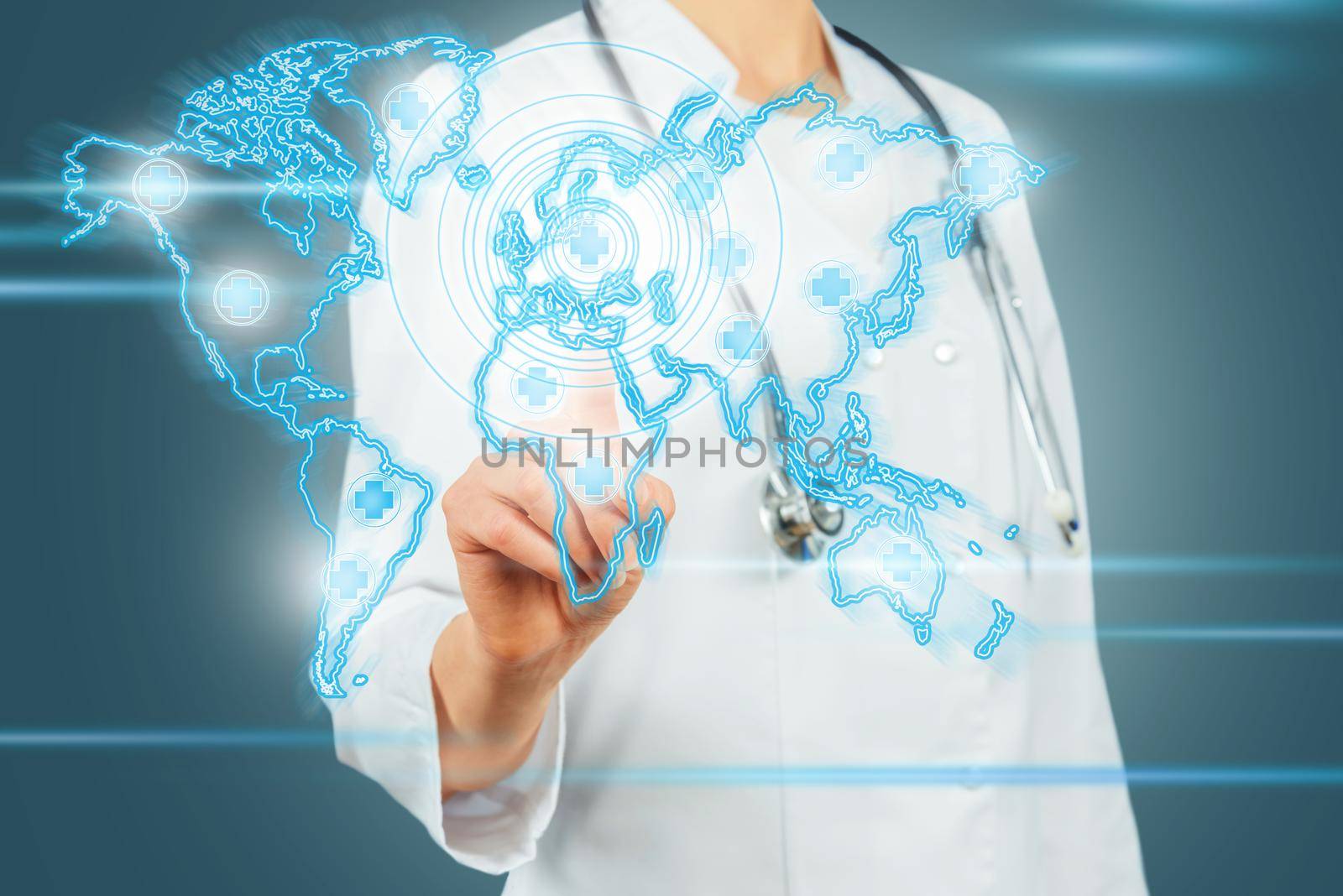 World map medical network on a background of female doctor with pen. Concept: Medical services worldwide