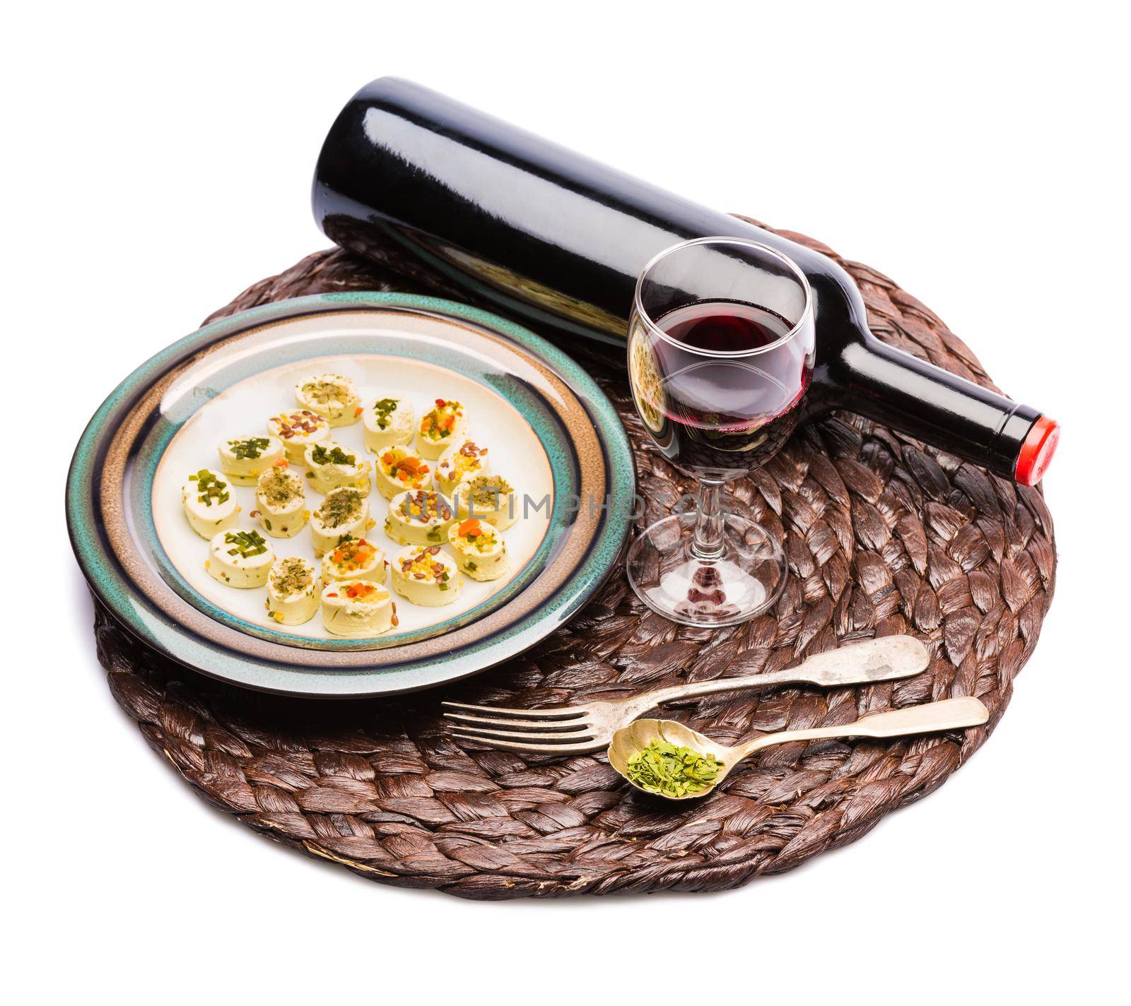wine and pieces of cheese on wicker rack isolated on a white background