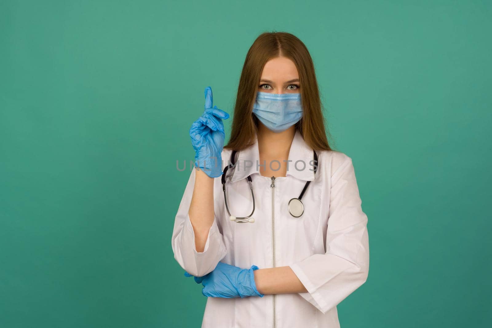 Covid19, coronavirus, healthcare and doctors concept. Portrait of professional confident young caucasian doctor in medical mask and white coat, stethoscope over neck, ready help patient, fight disease - image