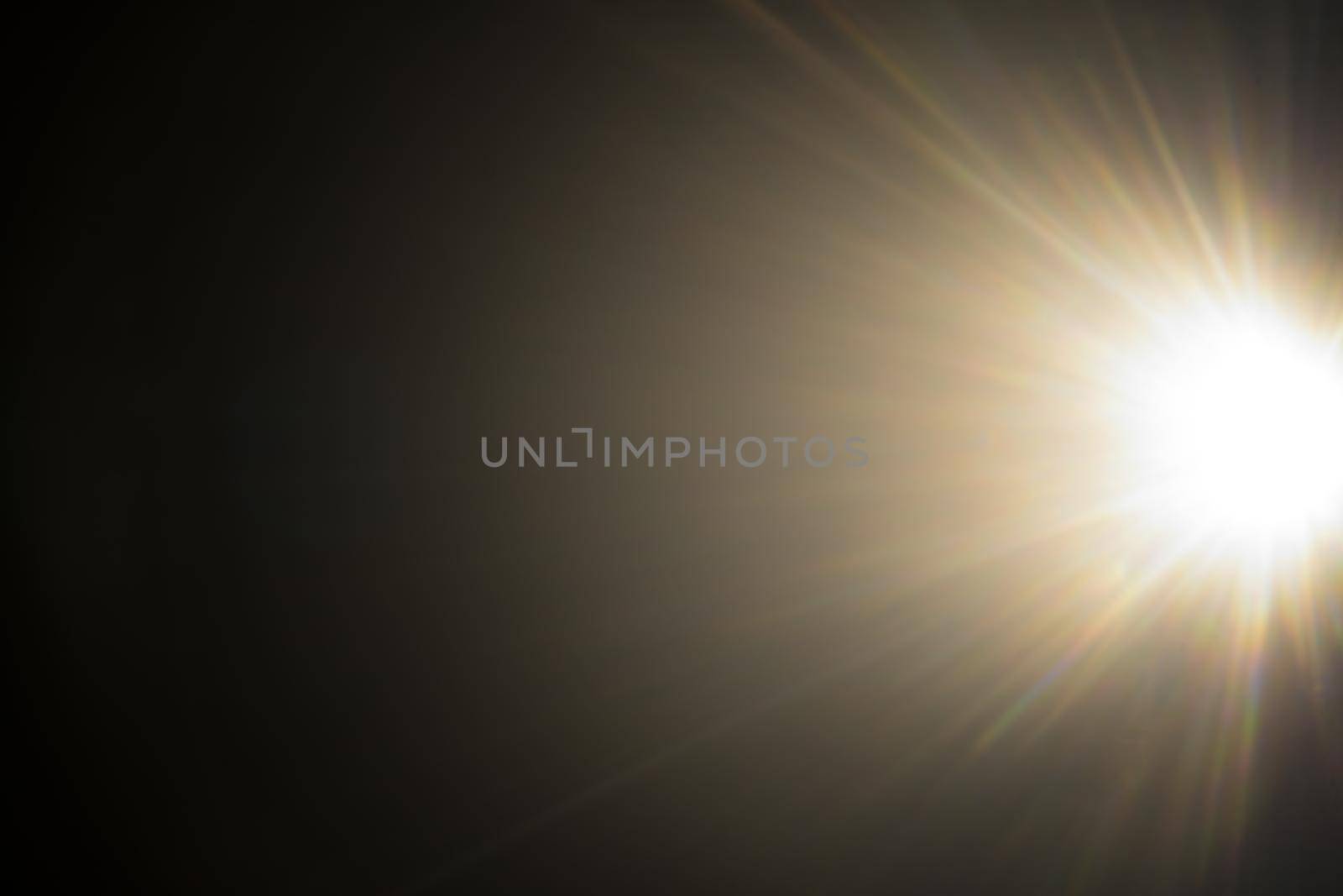 Abstract Natural Sun flare on the black.