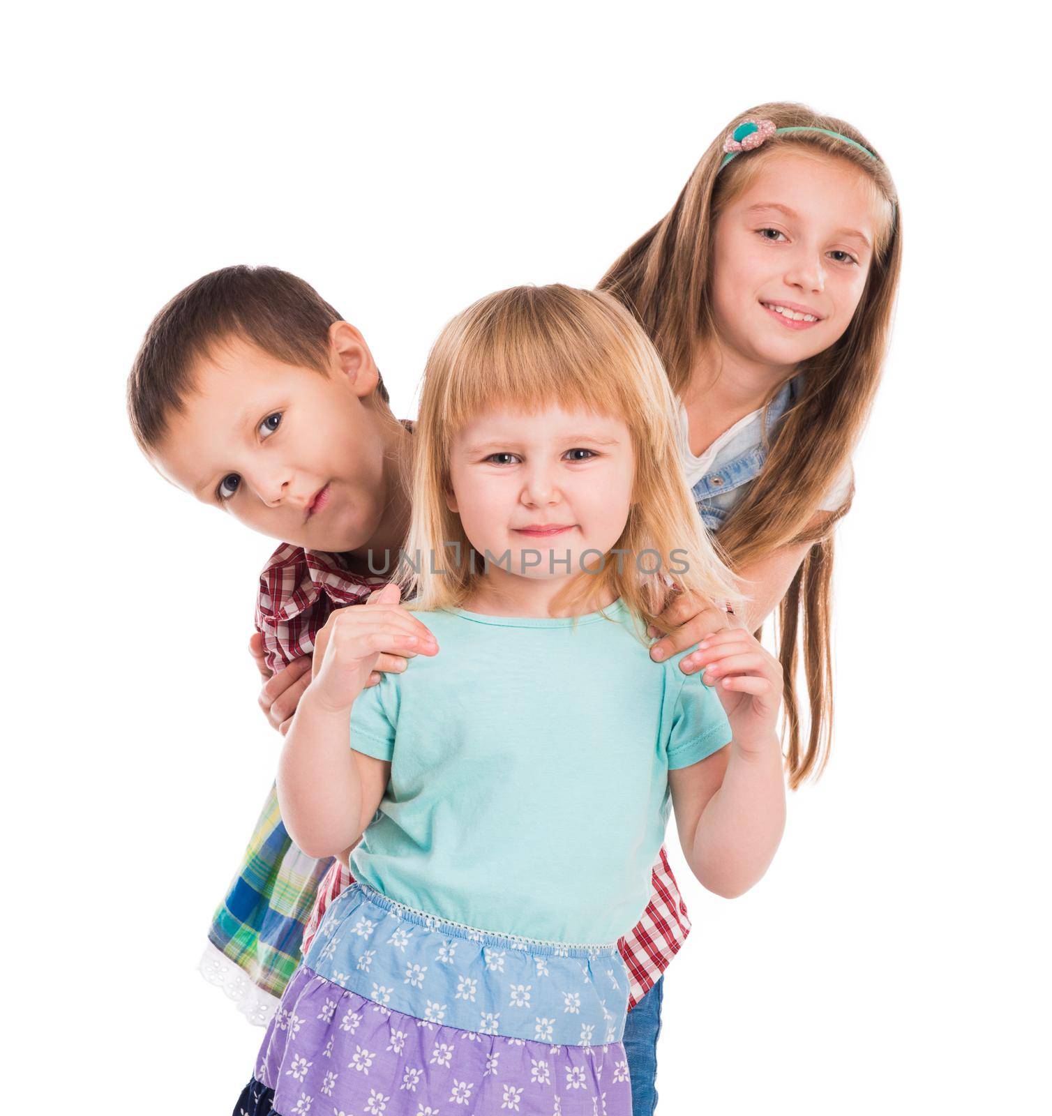 three cute children smiling isolated on white background