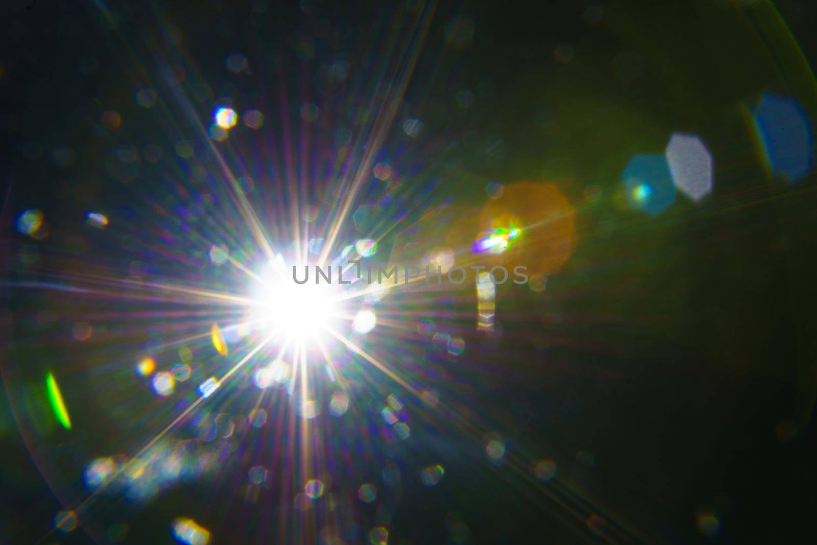 Abstract imitation sun starlight distant galaxy on a black background. -image