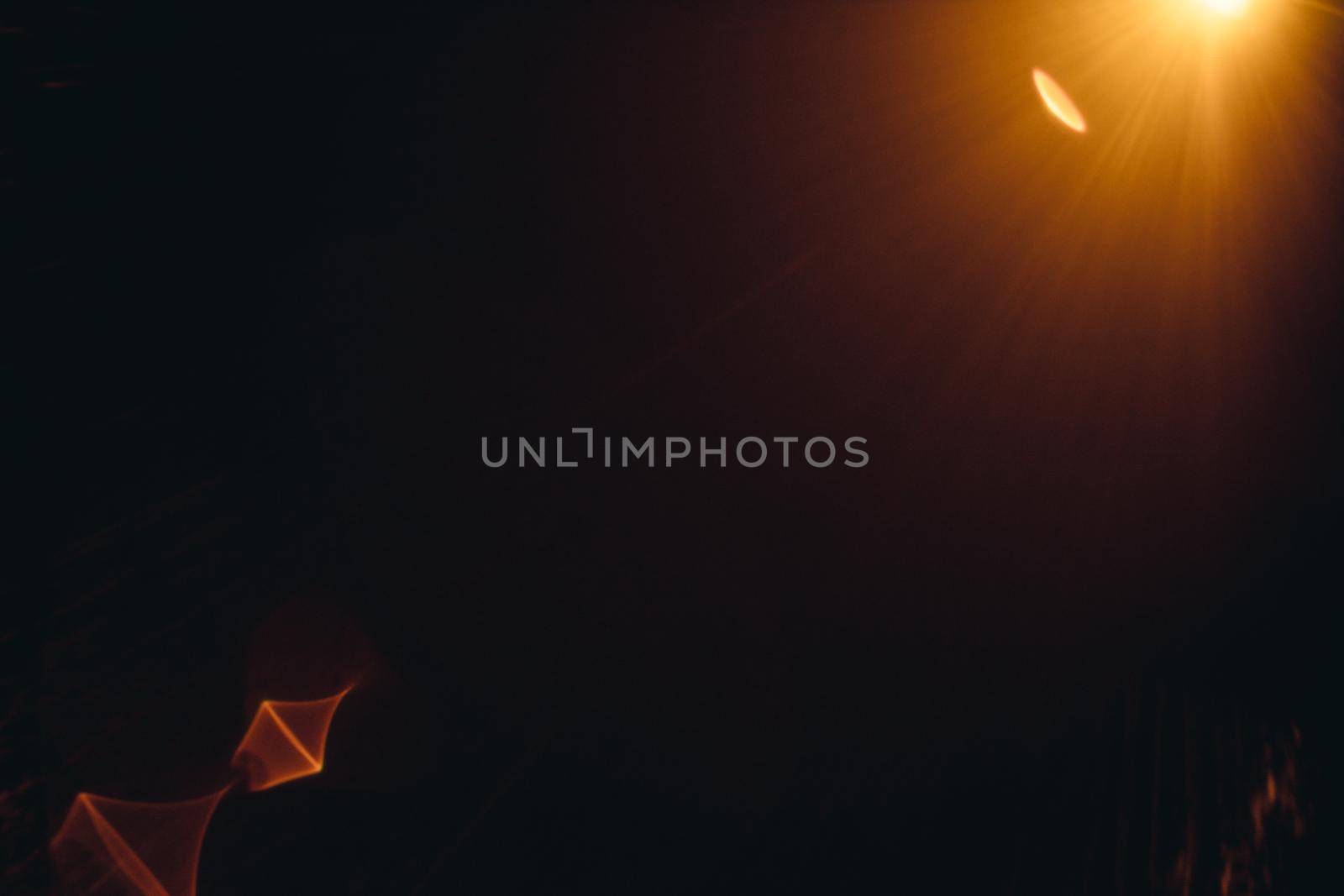 Abstract Natural Sun flare on the black.