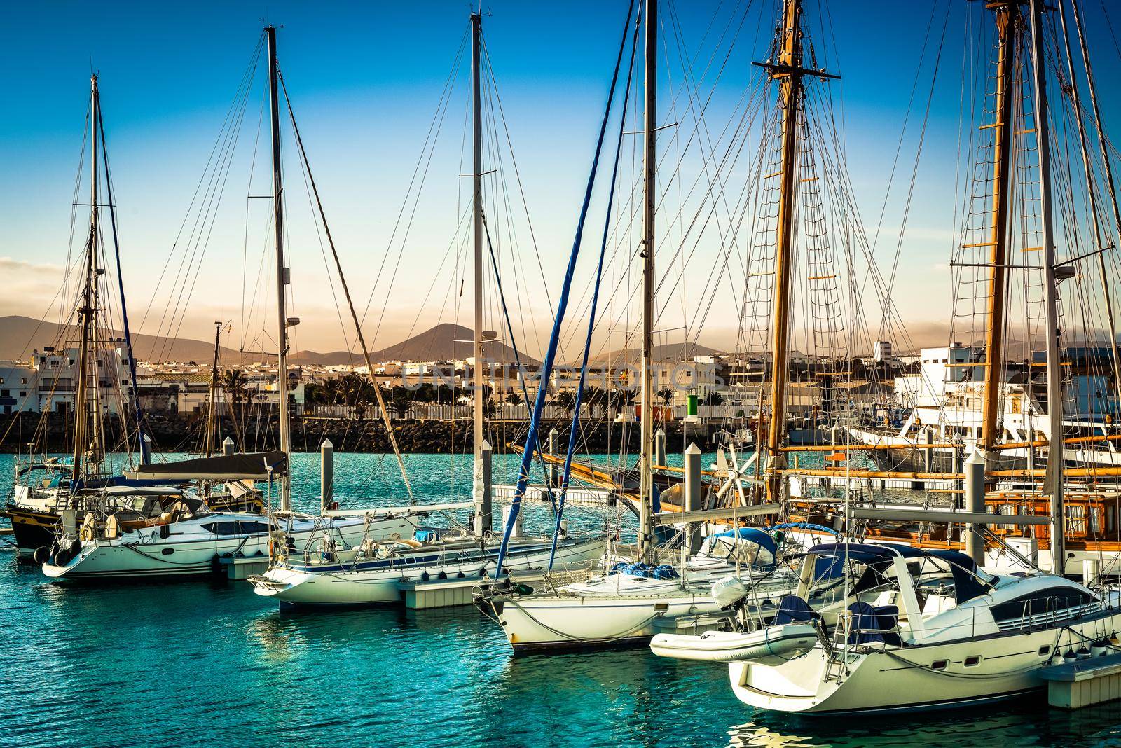 yacht bay on amazing backgrount with city and mountains