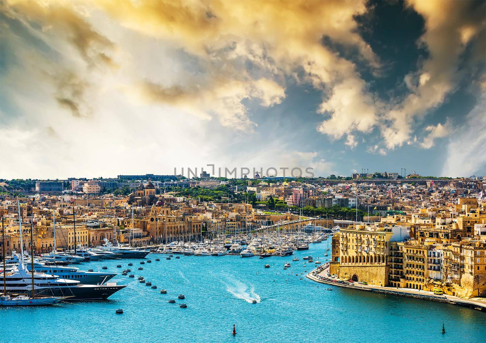 beautiful panoramic view on Valletta from the sea at sunset in Malta